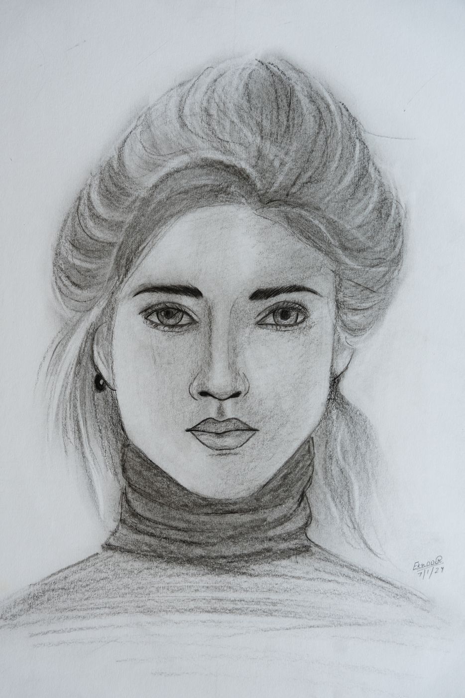 Charcoal portrait of a woman in a turtleneck